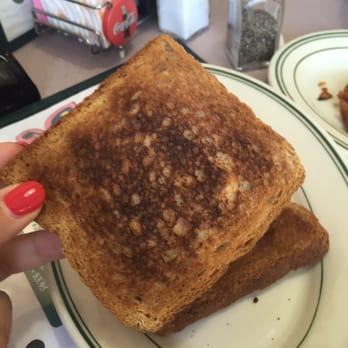 Scramblers - Burnt uncut toast. Uncooked home fries.  Uncooked bacon. Barely cooked has brown #1 with dirty grease.  Bunt hash brown number 2. - Breakfast & Brunch Near Me - Johnston, Rhode Island