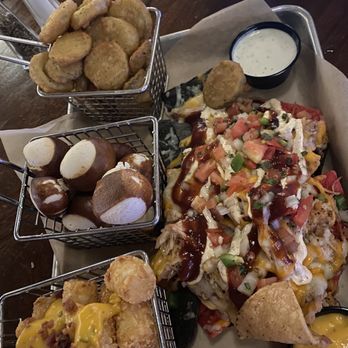 ENTERRIUM - Tater tots, fried pickle, pulled pork nachos, pretzel bites = enterrium platter - New American Near Me - Schaumburg, Illinois