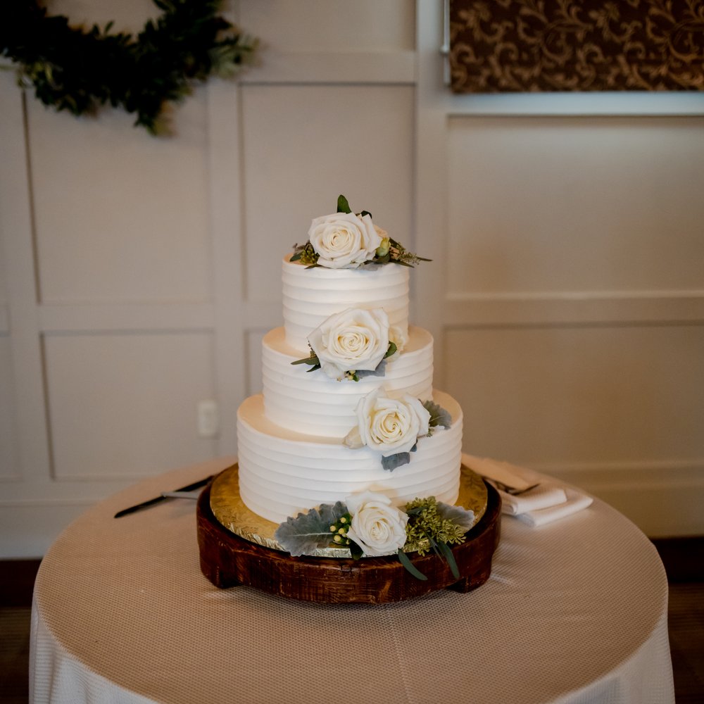 Floral Arts - We asked Michael to place a few white roses and greenery on our cake - beautiful and simple! - Florists Near Me - Westford, Massachusetts Floral Arts - We asked Michael to place a few white roses and greenery on our cake - beautiful and simple! - Florists Near Me - Westford, Massachusetts