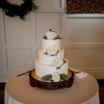 Floral Arts - We asked Michael to place a few white roses and greenery on our cake - beautiful and simple! - Florists Near Me - Westford, Massachusetts Floral Arts - We asked Michael to place a few white roses and greenery on our cake - beautiful and simple! - Florists Near Me - Westford, Massachusetts