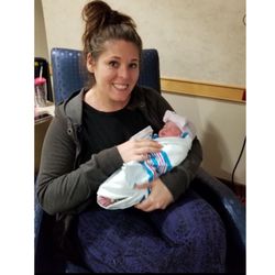 Gentle Seed Doulas - Lisa, co-owner and doula, snuggling our newest doula baby!