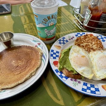 Sunrise Memphis - East Memphis - Avocado toast breakfast with eggs over easy and side pancake. - Breakfast & Brunch Near Me - Memphis, Tennessee Sunrise Memphis - East Memphis - Avocado toast breakfast with eggs over easy and side pancake. - Breakfast & Brunch Near Me - Memphis, Tennessee