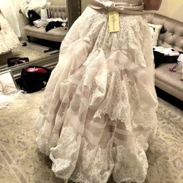 This was their suggestion solution to my bustle! What an injustice to a beautifully detailed dress!