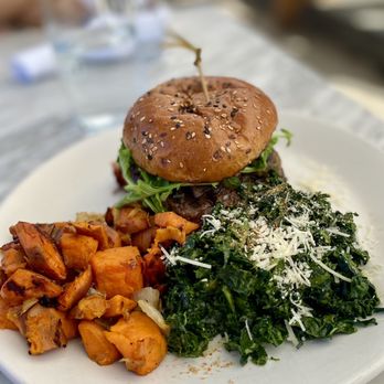 True Food Kitchen - Grass-Fed Burger with half Sweet Potatoes and half Kale Salad. - Vegetarian Near Me - Pasadena, California True Food Kitchen - Grass-Fed Burger with half Sweet Potatoes and half Kale Salad. - Vegetarian Near Me - Pasadena, California