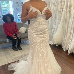Silk Bridal Studio - Niece trying on the dresses. This is not the one she chose.