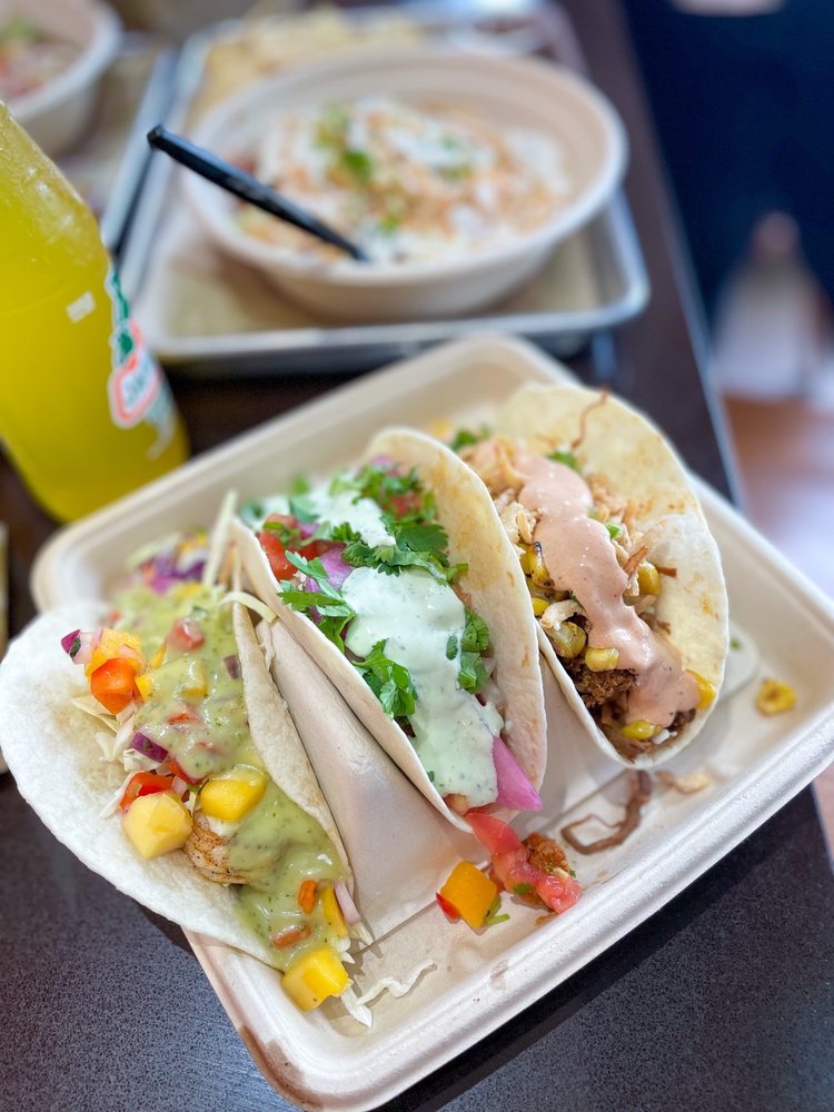 Mucho Burrito Fresh Mexican Grill Logo