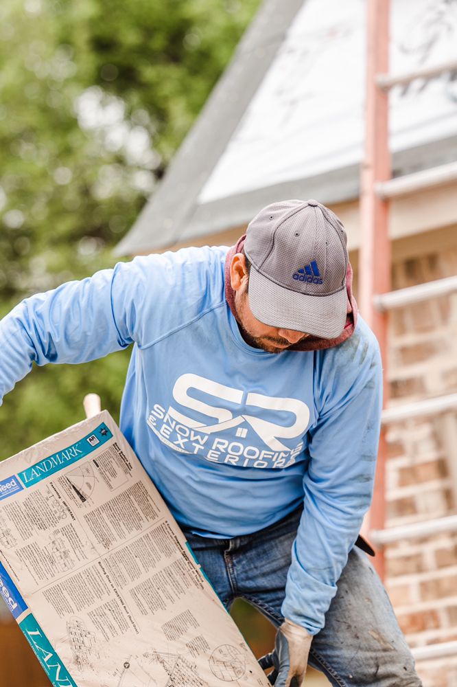 Slide of Snow Roofing and Exteriors