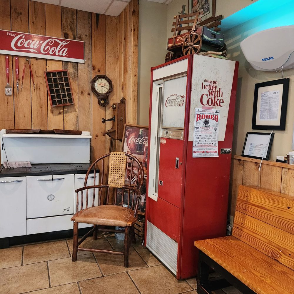 Carroll's Barbeque - a coke machine and a chair - Barbeque Near Me - Blue Ridge, Georgia Carroll's Barbeque - a coke machine and a chair - Barbeque Near Me - Blue Ridge, Georgia