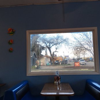 La Casa Del Guacamole - a view of a street through a window - Mexican Near Me - Madera, California La Casa Del Guacamole - a view of a street through a window - Mexican Near Me - Madera, California