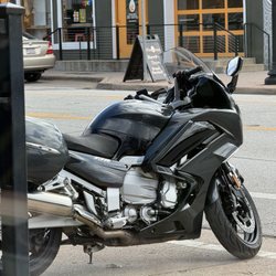 American Motorcycle Trading Company - Yamaha FJR1300es parked on street.