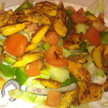 Crown Fried Chicken - a salad on a paper plate - Chicken Wings Near Me - Brooklyn, New York Crown Fried Chicken - a salad on a paper plate - Chicken Wings Near Me - Brooklyn, New York