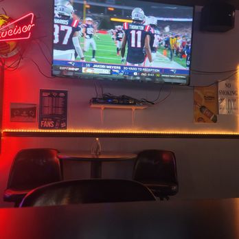 Pour House Lounge - a large television in a bar - Bars Near Me - Satellite Beach, Florida Pour House Lounge - a large television in a bar - Bars Near Me - Satellite Beach, Florida
