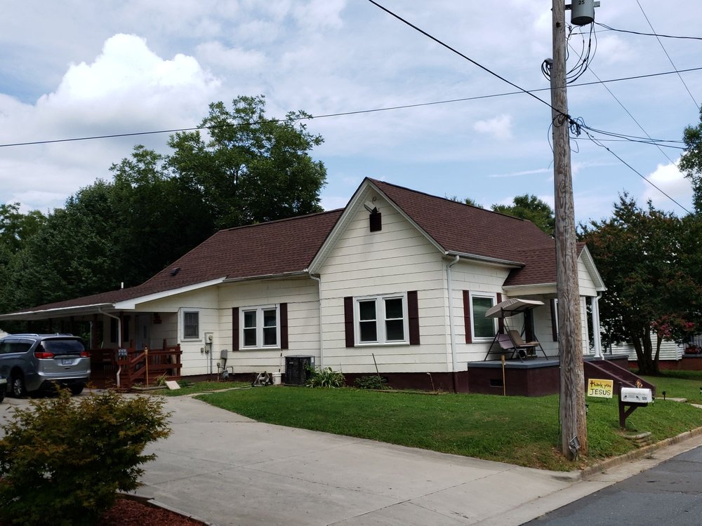 Slide of King Roofing Pros