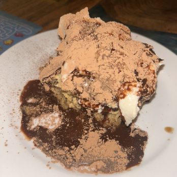 Sanctuary Bistro - TIRAMISU*: Ladyfinger cake soaked in chocolate espresso sauce with cashew mascarpone - Vegan Near Me - Charlotte, North Carolina Sanctuary Bistro - TIRAMISU*: Ladyfinger cake soaked in chocolate espresso sauce with cashew mascarpone - Vegan Near Me - Charlotte, North Carolina