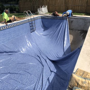 Outdoor Concepts - Bags of unused concrete on pool deck! - Hot Tub & Pool Near Me - Orange City, Florida