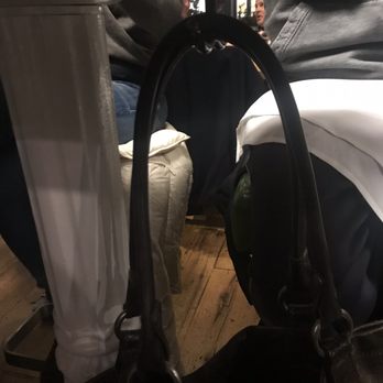 True Food Kitchen - Hooks under the table to hang your purse and/or coat - New American Near Me - Denver, Colorado True Food Kitchen - Hooks under the table to hang your purse and/or coat - New American Near Me - Denver, Colorado