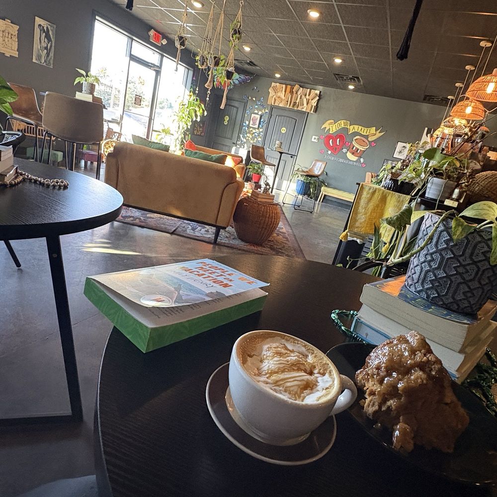 Pistachio cortado with whip cream and caramel drizzle along with banana nut bread which had a delicious glaze on it Pistachio cortado with whip cream and caramel drizzle along with banana nut bread which had a delicious glaze on it