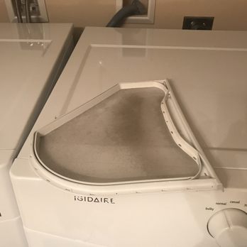 Meadowridge Apartments - Cracked, slow to turn dryer with heavily discolored dirty filter. - Apartments Near Me - Pewaukee, Wisconsin Meadowridge Apartments - Cracked, slow to turn dryer with heavily discolored dirty filter. - Apartments Near Me - Pewaukee, Wisconsin