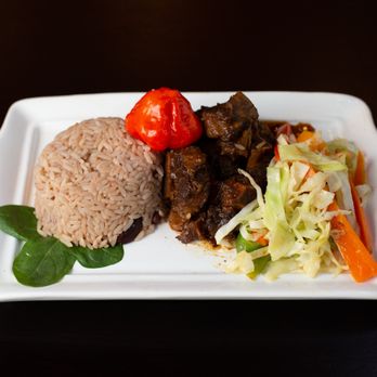 Don's - a plate of food on a table - Caribbean Near Me - Brampton, Ontario Don's - a plate of food on a table - Caribbean Near Me - Brampton, Ontario
