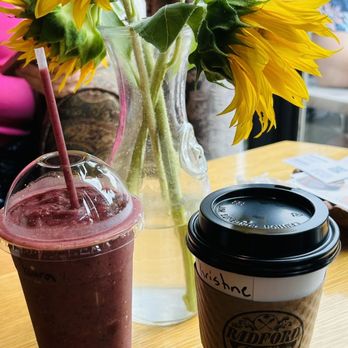 Radford Coffee Company - a vase of sunflowers and a cup of coffee - Coffee & Tea Near Me - Radford, Virginia Radford Coffee Company - a vase of sunflowers and a cup of coffee - Coffee & Tea Near Me - Radford, Virginia