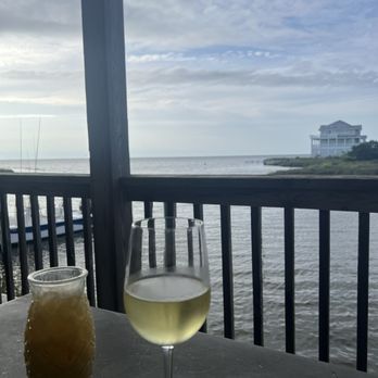 Po House - Painkiller and glass of Chardonnay. - Seafood Near Me - Avon, North Carolina