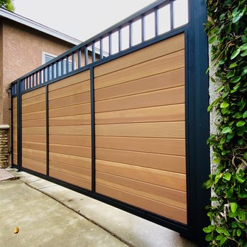 Pristine Garage Doors and Gate Repair - Metal frame and redwoods combined - Garage Door Services Near Me Pristine Garage Doors and Gate Repair - Metal frame and redwoods combined - Garage Door Services Near Me