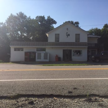Mac's Country Store - a car parked in front of the store - Convenience Stores Near Me - Massies Mill, Virginia