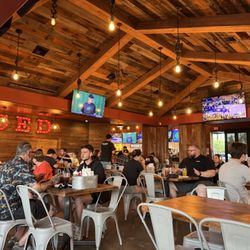 Sauced BBQ & Spirits - Orange - Indoor seating area in main dining 05.31.25