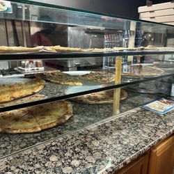 Gino's NY Pizza Elmwood - Slices available