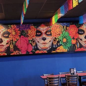 Veracruz - a mexican restaurant with a large mural of sugar skulls - Mexican Near Me - Middletown, Ohio