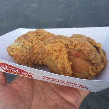 Krispy Krunchy Chicken - a hand holding a piece of fried chicken - Chicken Shop Near Me - Reno, Nevada Krispy Krunchy Chicken - a hand holding a piece of fried chicken - Chicken Shop Near Me - Reno, Nevada
