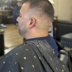 Chapter 1 Barbershop - Beard Line up and skin fade with 5 guard on top. Barbershop in Ventura.