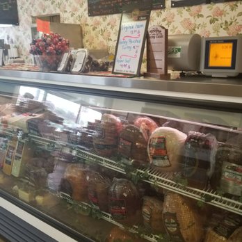 Walnut Leaf Country Market - a display case full of food - Flowers & Gifts Near Me - Camargo, Kentucky