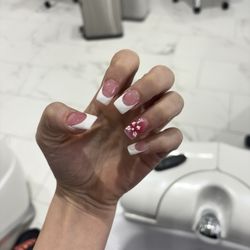 Sky Nails - My friends god awful nails she payed 75$ for