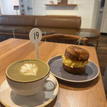 SACRÉ SUCRÉ - My order! Croissant egg sandwich and hojicha latte - Macarons Near Me - Baltimore, Maryland SACRÉ SUCRÉ - My order! Croissant egg sandwich and hojicha latte - Macarons Near Me - Baltimore, Maryland