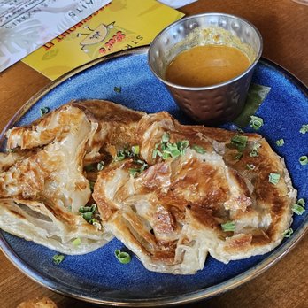 Straits - Honolulu - Roti Prata... traditional Indian flatbread, scallions, and yellow coconut curry dip - Asian Fusion Near Me - Honolulu, Hawaii