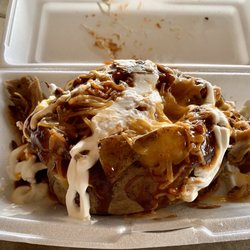 Baked & Loaded - The ginormous pulled pork bbq loaded potato. WOWZA!