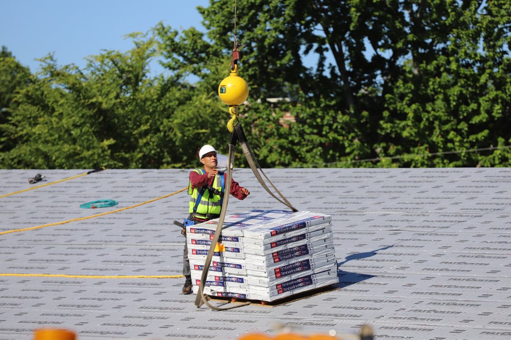 Slide of Bell Roofing