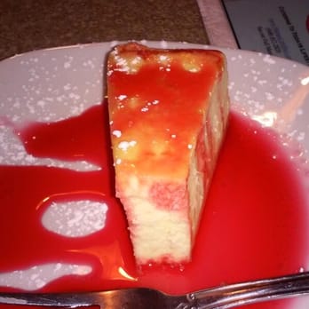 Mama's Cafe Baci - New York style cheesecake drizzled with raspberry syrup - Italian Near Me - Hackettstown, New Jersey