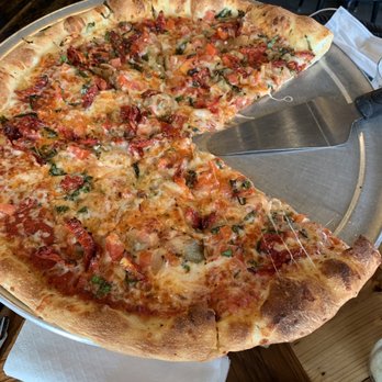 Walter's303 - Sundries tomato, ricotta, caramelized onion, and fresh basil - Pizza Near Me - Denver, Colorado Walter's303 - Sundries tomato, ricotta, caramelized onion, and fresh basil - Pizza Near Me - Denver, Colorado