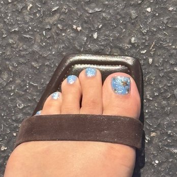 Britton Nails Salon and Spa - Sparkly blue gel with star design - Nail Salons Near Me - Lacey, Washington