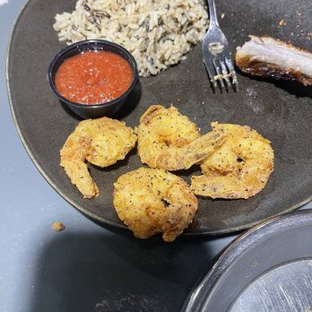 Heroes Tastes + Taps - We were sharing two plates this is not how it was plated. This was wild-life pilaf, fried shrimp, and ribs. - New American Near Me - Branson, Missouri Heroes Tastes + Taps - We were sharing two plates this is not how it was plated. This was wild-life pilaf, fried shrimp, and ribs. - New American Near Me - Branson, Missouri