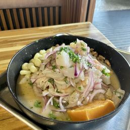 Ceviche Mixto ($22) -- shrimp, white fish, squid, hominy, corn nuts.  Really refreshing and yummy, nice portion of protein too!