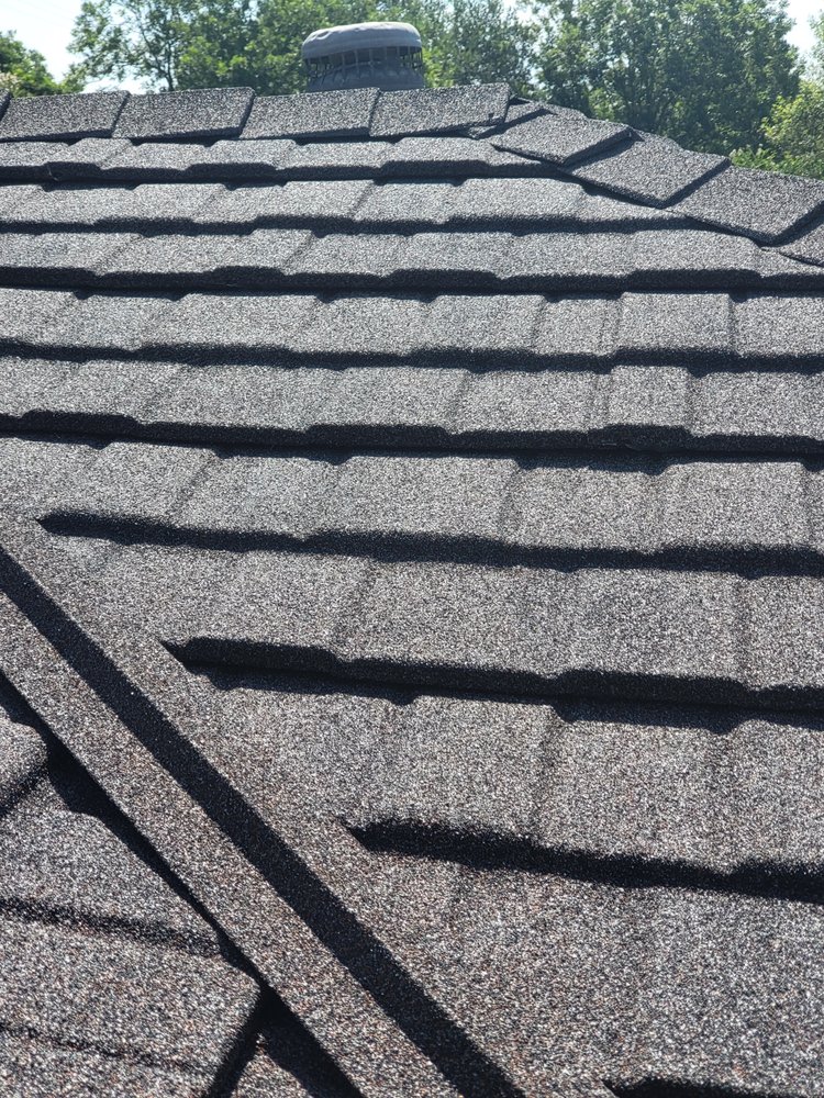 Slide of JC Metal Roofing Brownwood