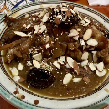 Aicha Moroccan Cuisine - Lamb Tagine with Prunes and Almonds - Moroccan Near Me - San Francisco, California