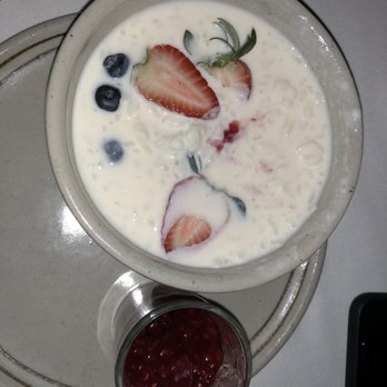 La Joya Restaurante - Rice pudding dessert with a raspberry sauce. - Mexican Near Me - Cancún, ROO La Joya Restaurante - Rice pudding dessert with a raspberry sauce. - Mexican Near Me - Cancún, ROO