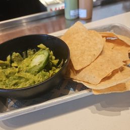 The guac and chips was really good was half way through when I took this picture devoured the food. The guac and chips was really good was half way through when I took this picture devoured the food.