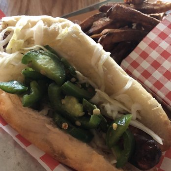 Wvrst - Pheasant sausage with jalapeño and sauerkraut (cold) with Duck Frites Fries - German Near Me - Toronto, Ontario Wvrst - Pheasant sausage with jalapeño and sauerkraut (cold) with Duck Frites Fries - German Near Me - Toronto, Ontario