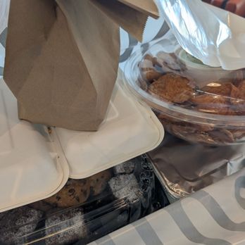 The Stand - American Classics Redefined - Chicken and Ahi Tuna in the white boxes. Chips & Guac next to the white boxes. Meyer Lemon Broccolini and Cookie & Brownie Platter below - Burgers Near Me - Long Beach, California
