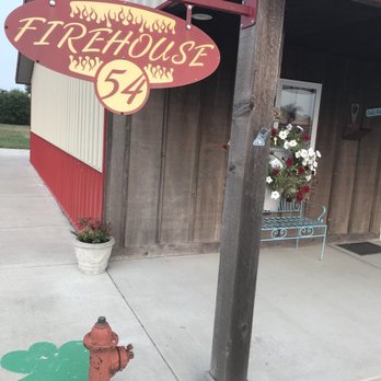 Firehouse 54 - a fire hydrant in front of a restaurant - Pizza Near Me - Eagleville, Missouri